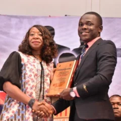 Mrs_Doris_Akpovwa_eceives_her_award_at_TAS.2.0